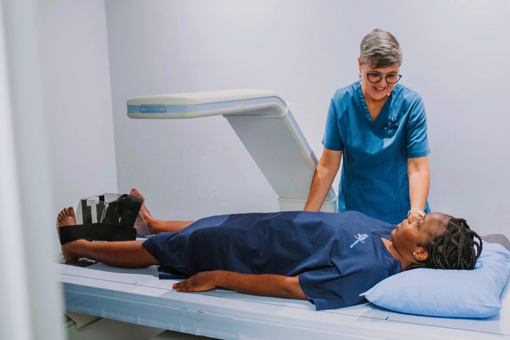 A DEXA scan is used to measure bone mineral density (BMD) and diagnose osteoporosis.