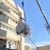 An MRI magnet, hoisted and delivered to site by an industrial crane.